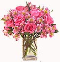 Pink roses and mix flowers in a Vase:  same day delivery available