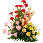 Send New Year Gifts with Exotic Flowers Arrangementwith Carnation and Ferrero Rocher Chocolates.