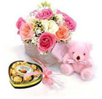 Send New Year Gifts with Mixed Flower Bouquet with Teddy and a Imported Heart Shape Chocolate Box 