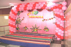 Balloon Decorations with flowers, back drops, name letter etc. but without stage.