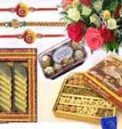 Rakhi Gifts with 1 Kg Sweets, 1Kg Dry Fruits, 16 Pcs Ferrero Rocher Chocolate Box and 12 Mixed Roses Bouquet with Free Rakhi to Chennai Delivery