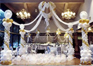 Balloon Decoration with Party Hall balloon decoration with four pillars, heart .spray of balloons, groups of Balloons with falling cloth to Chennai Delivery