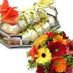 Send New Year Gifts with 1 Kg Kaju sweets and a Mixed Flower Bouquet