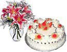 Anniversary Gifts with 10 Lilly in a vase with 1kg cake  to Chennai Delivery