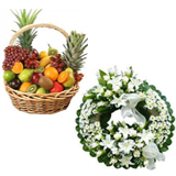 Send Large wreath with mixed flowers and 5 Kgs Fruit Baskets to chennai delivery